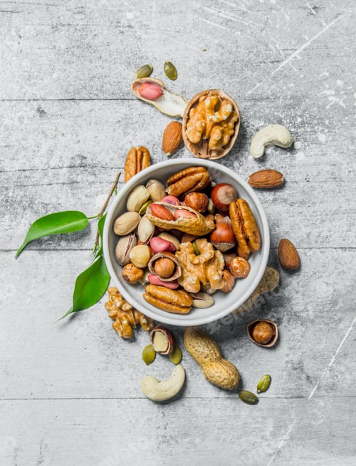 Preview: Nut Assortment in Bowl on Textured Background
