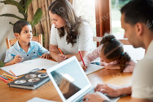 Preview: Mother helping her children with their homework. Businessman working from home on his laptop with f