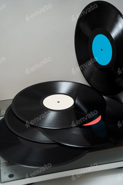 Preview: Closeup of modern turntable and vinyl records with clean Hi Fi audio