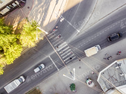 Preview: overhead people crossing the street on the crosswalk