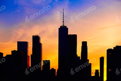 Preview: New York City skyline silhouette, at sunset.