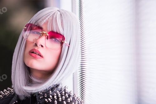 Preview: Beautiful woman illuminated by led lights