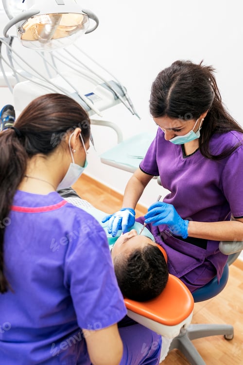 Preview: Dentists working in dental clinic