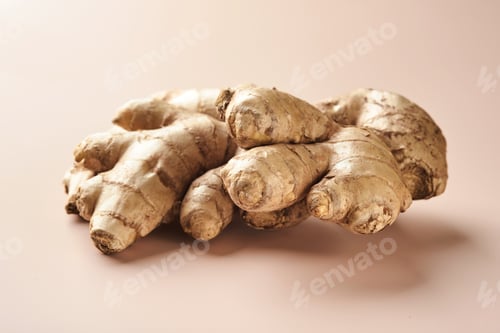 Preview: Ginger root. Fresh ginger root on a beige background. Vitamins. Virus-protecting products. Top view.