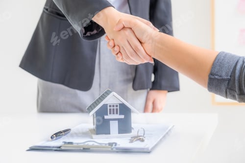 Preview: Real estate agents and buyers handshake after signing a business contract, renting, buying