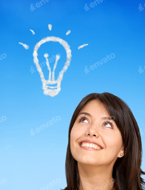 Preview: Thoughtful Woman Coming Up With An Idea Smiling