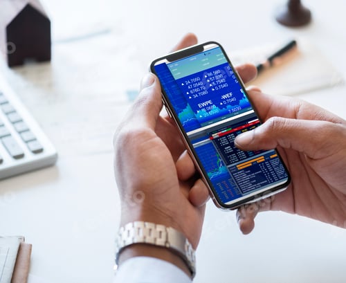 Preview: Businessman checking stock market online