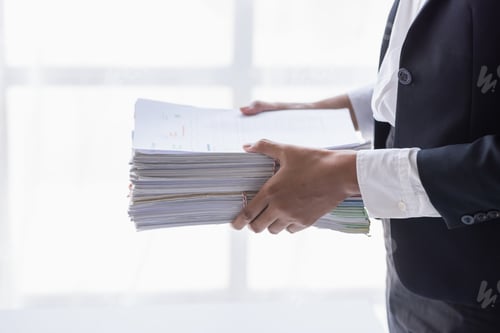 Preview: Business Employee Asian woman hand working in Stacks paper files for searching and check unfinished