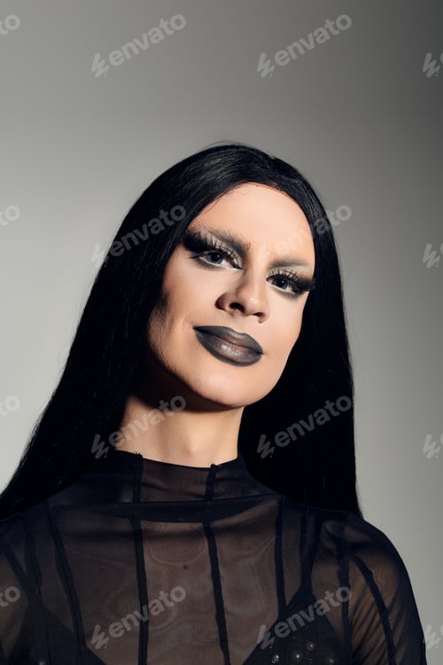 Preview: Stylish gender fluid drag queen showcasing fierce fashion in a captivating studio setting