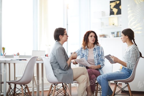 Preview: Modern Young Women Discussing Business