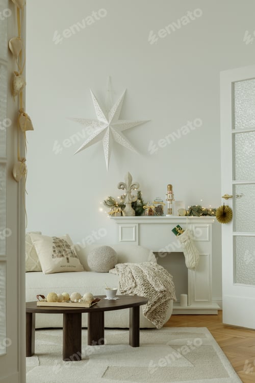 Preview: Festive fireplace setting. Elegant Christmas decor around the fireplace, with a white star.