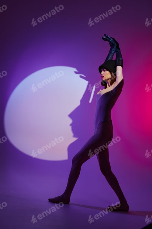 Preview: Beautiful fashionable girl scene spotlight posing neon color background unaltered