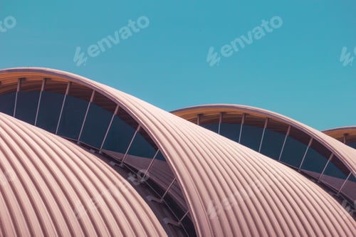 Preview: Closeup shot of creative, roundish roofs under the blue sky