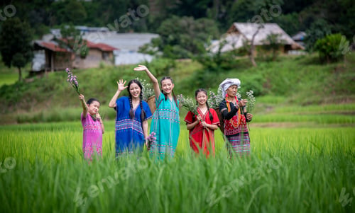 Preview: people, possibly from different generations, dressed in colorful traditional clothing, standing in a