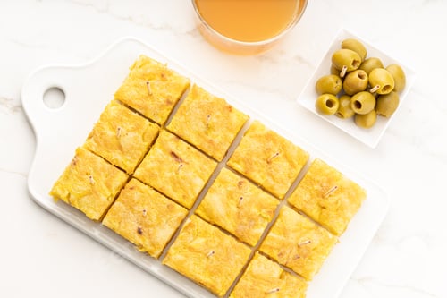 Preview: Spanish potato omelette appetizer called tortilla on marble table