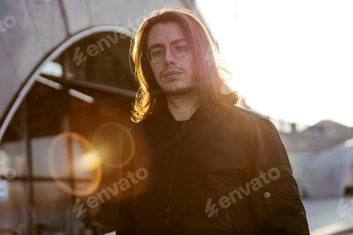 Preview: Portrait of photography. Portrait of man with film camera. Looking for camera