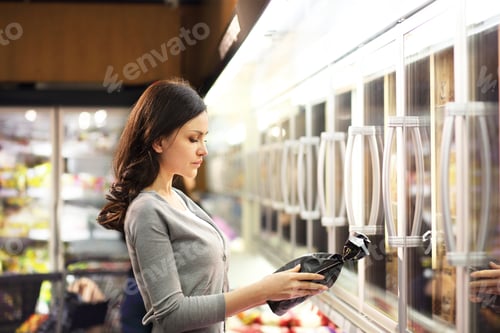 Preview: Women Choosing A Dairy Products At Supermarket