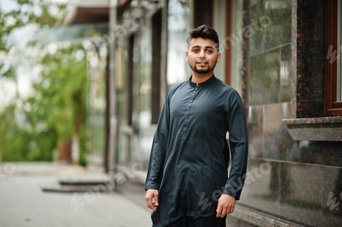 Preview: Сonfident pakistani indian muslim arabic boy in grey kameez shalwar suit.