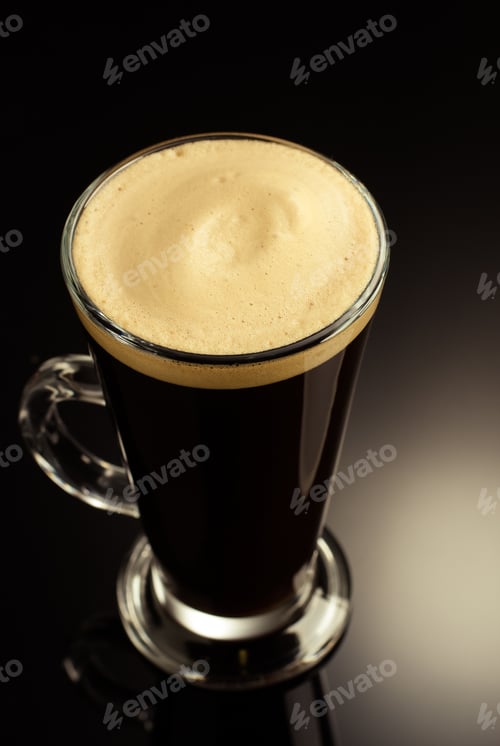 Preview: coffee in glass cup on black background