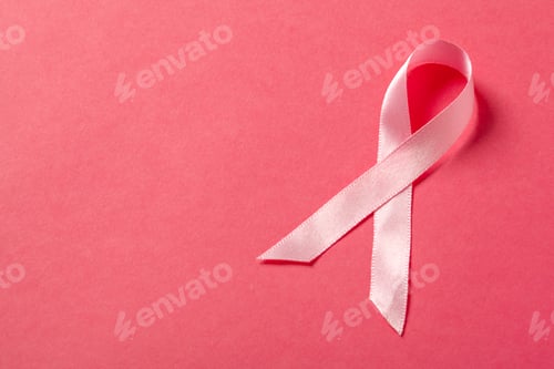Preview: Pink ribbon symbol on pink background for awareness and support campaigns