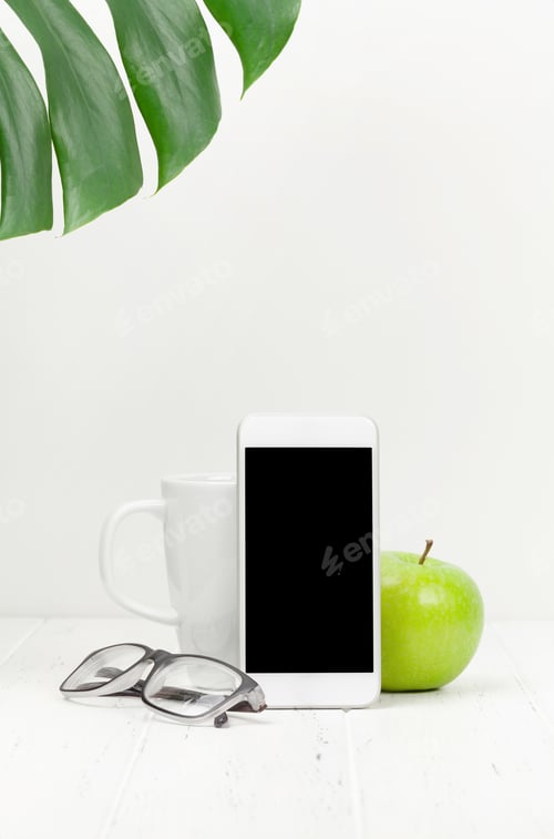 Preview: Workplace with smartphone, apple and coffee cup