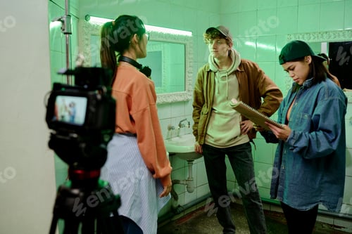 Preview: Filming Scene in Green-Tiled Bathroom with Crew Working