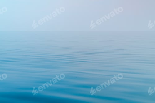 Preview: Blue sea with gentle waves and a sky, a peaceful ocean with small waves that are pleasing to the eye