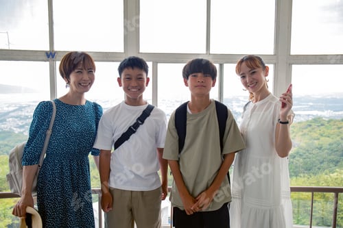 Preview: Two Japanese women and their teenage sons on a day out