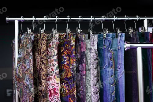 Preview: Stylish Printed Pants on a Clothing Rack