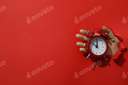 Preview: Red alarm clock on a red background