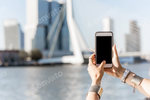 Preview: Smartphone on the modern city background