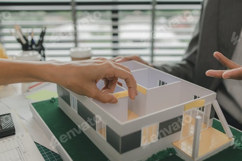 Preview: a foreman is consulting with an engineer about house structure, n architect and assistant are brains
