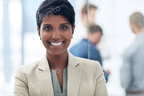 Preview: Shes young and goal oriented. Cropped portrait of a businesswoman standing in the office.