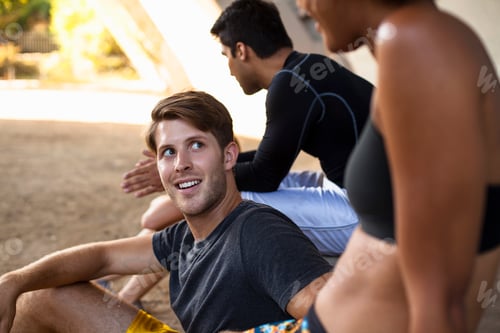 Preview: Joggers taking break on bridge