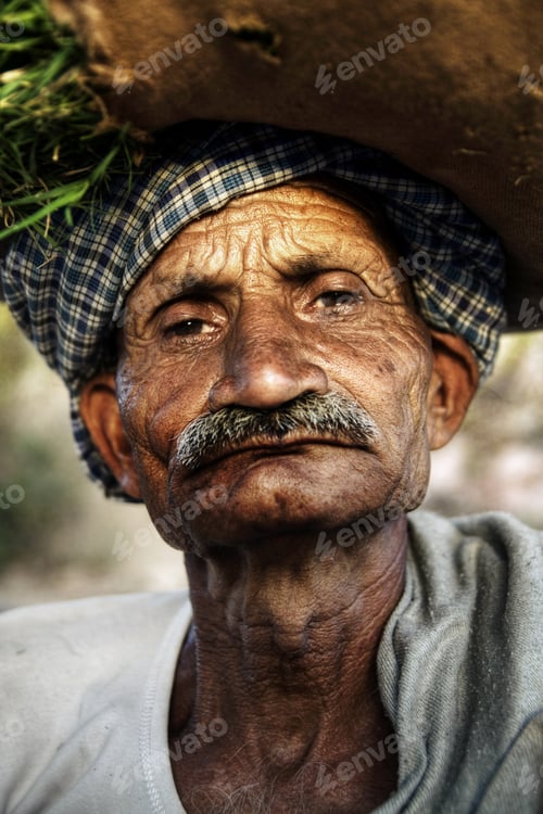 Preview: Indigenous Senior Indian Man Looking Grumpy At The Camera