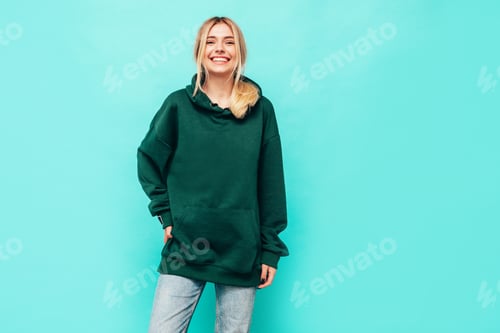 Preview: Portrait of young beautiful blond girl posing in studio