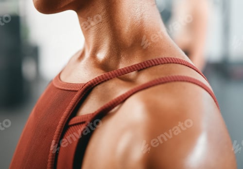 Preview: Shoulder, closeup and injury on woman at gym for fitness, training or workout while feeling discomf