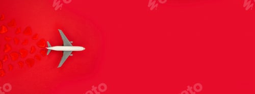 Preview: Valentine's card, beautiful red background with airplanes. Selective focus.