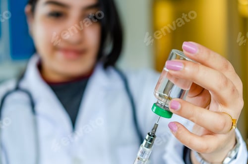 Preview: Medical Professional Preparing Injection in Hospital Setting