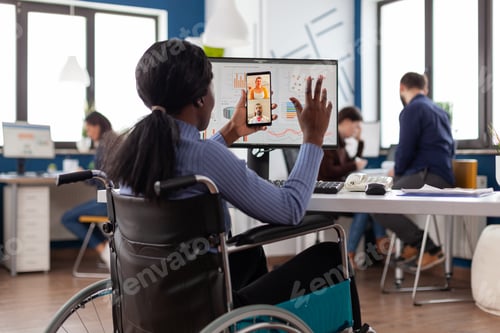 Preview: Handicapped disabled african american businesswoman greeting remote teamwork