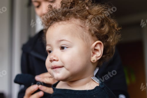 Preview: portrait beautiful baby relaxed at home with her father