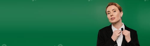 Preview: Elegant TV presenter in formal attire adjusts microphone against a vibrant green backdrop