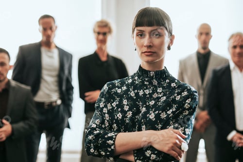 Preview: Confident business people standing together