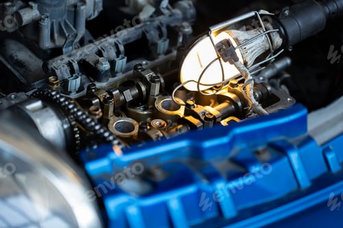 Preview: Master, car mechanic repairs the car engine at the service station