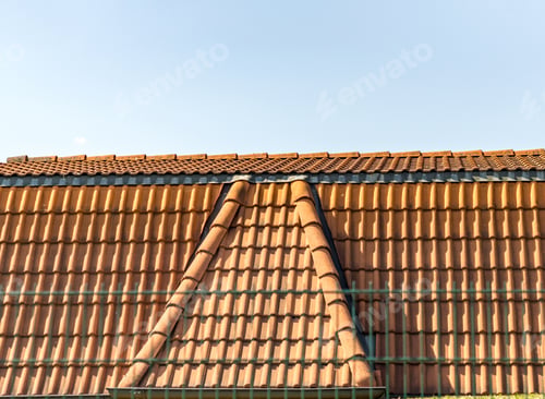 Preview: Roofline with shingles against blue sky with copy space