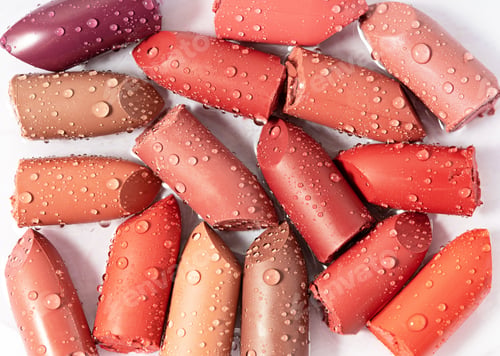 Preview: Various cut lipsticks on white background. Makeup product samples
