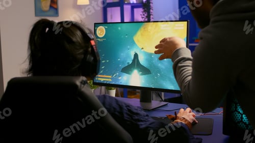 Preview: Couple of gamers playing multiplayer game