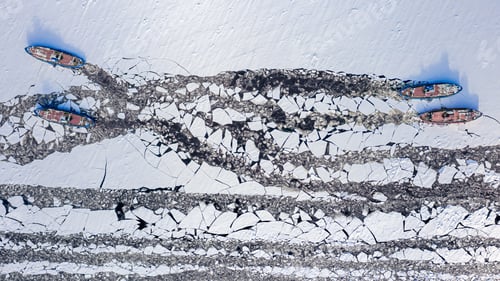 Preview: Four icebreakers crushing ice on Vistula river near Plock, Poland