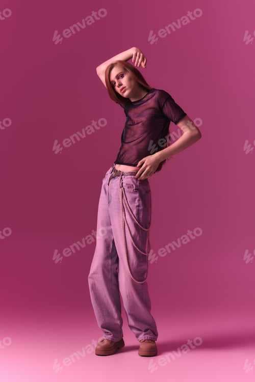Preview: Celebrating pride through vibrant fashion and bold self expression in a pink backdrop