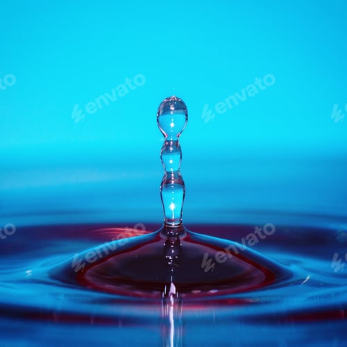 Preview: Macro shot of a water droplet on a vibrant blue background
